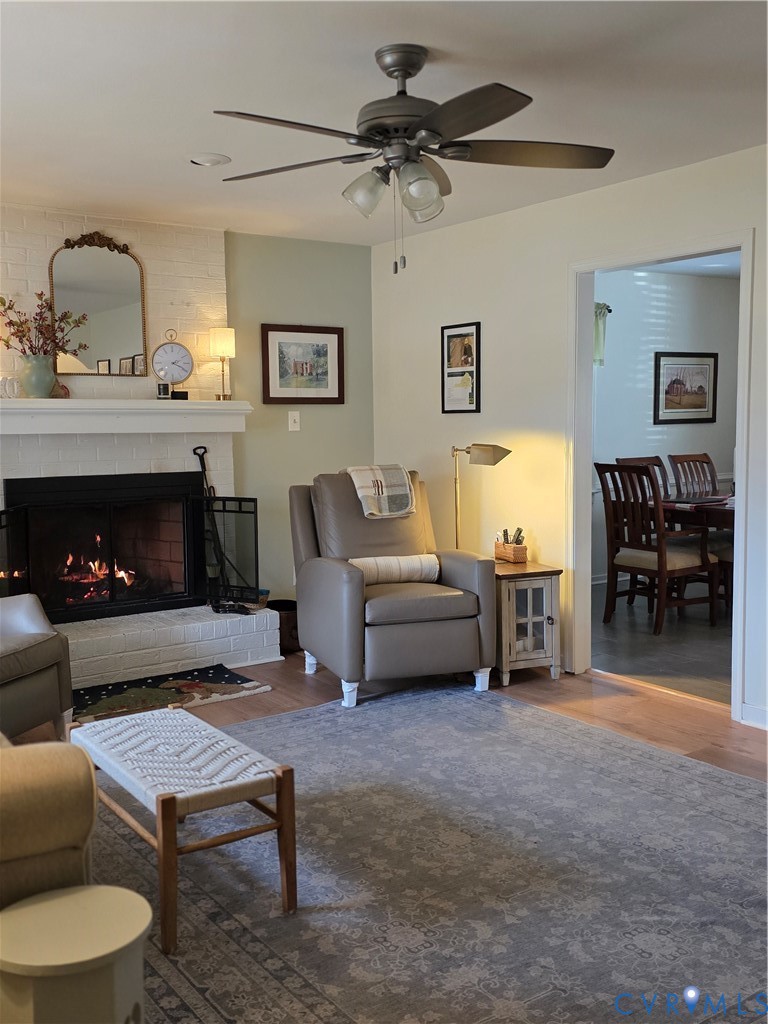 8511 Peaks Road Hanover, VA 23069 - Photo 14 of 48 a living room with furniture and a fireplace