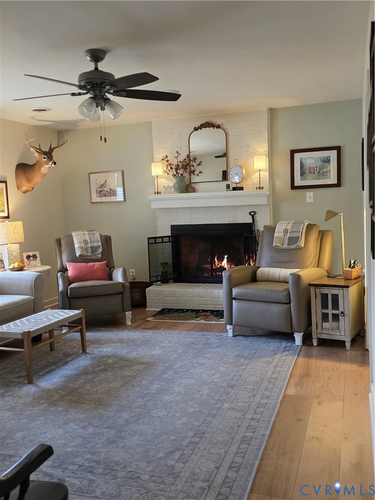 8511 Peaks Road Hanover, VA 23069 - Photo 15 of 48 a living room with furniture and a fireplace