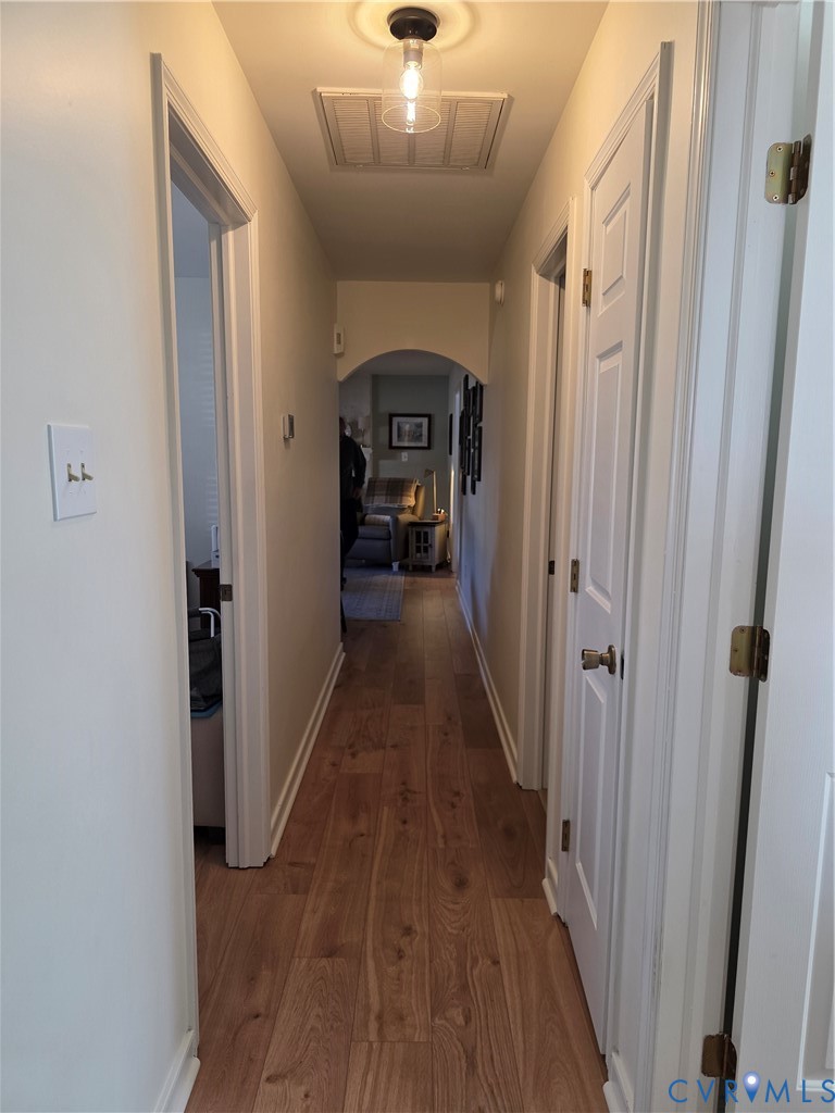 8511 Peaks Road Hanover, VA 23069 - Photo 26 of 48 a view of a hallway view with hardwood floor and staircase