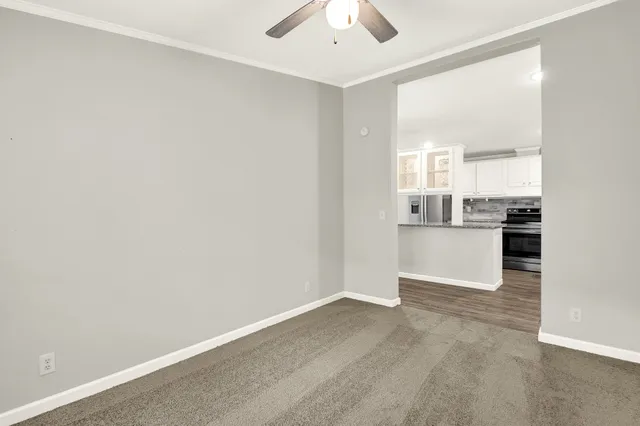a view of kitchen with wooden floor