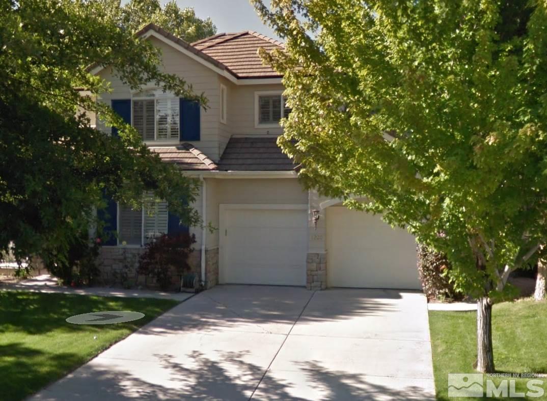 1220 Greenwich Way Reno, NV 89519 - Photo 1 of 1 a front view of a house with garden