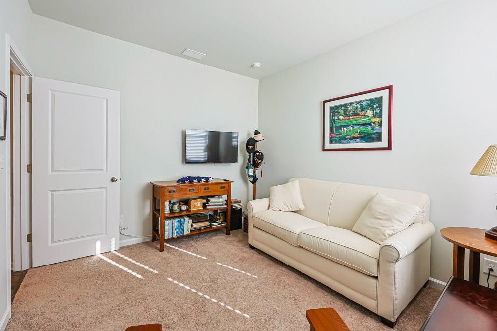 2115 Ridgedale Drive Conway, SC 29526 - Photo 15 of 38 Carpeted living area featuring baseboards