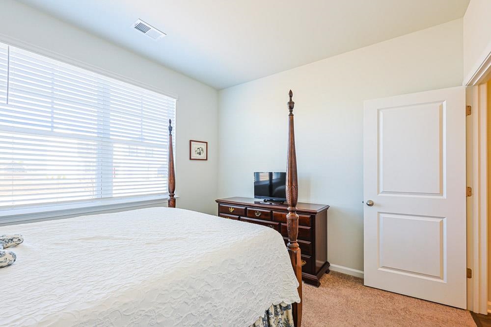 2115 Ridgedale Drive Conway, SC 29526 - Photo 19 of 38 Bedroom featuring light carpet and baseboards