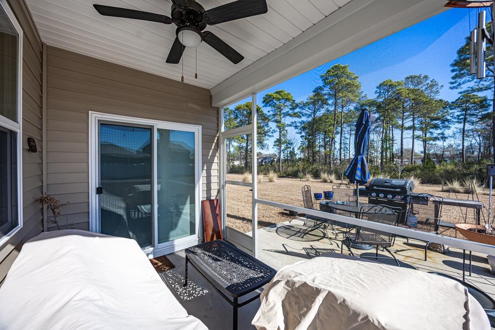 2115 Ridgedale Drive Conway, SC 29526 - Photo 26 of 38 View of patio / terrace with outdoor dining area and a ceiling fan