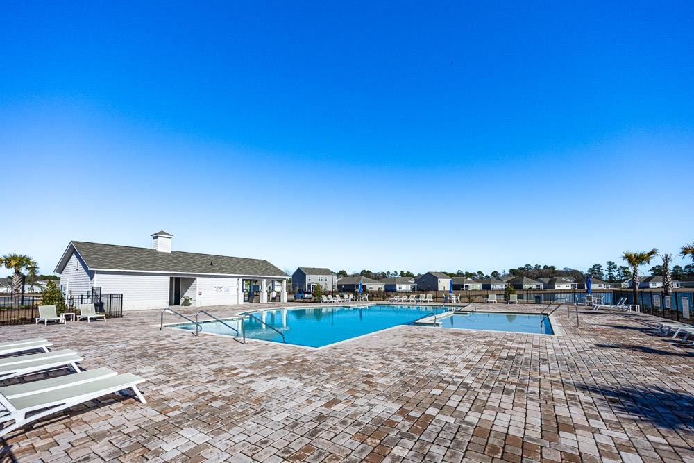2115 Ridgedale Drive Conway, SC 29526 - Photo 31 of 38 Community pool featuring a patio area and a residential view