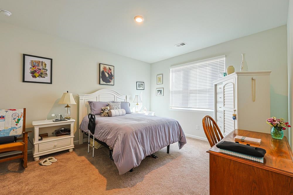 2115 Ridgedale Drive Conway, SC 29526 - Photo 9 of 38 Bedroom with light colored carpet and baseboards