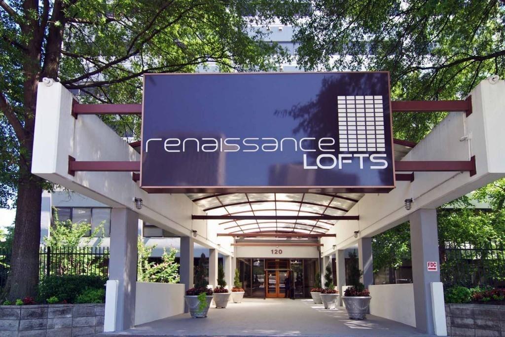 a view of a cafe with sitting area