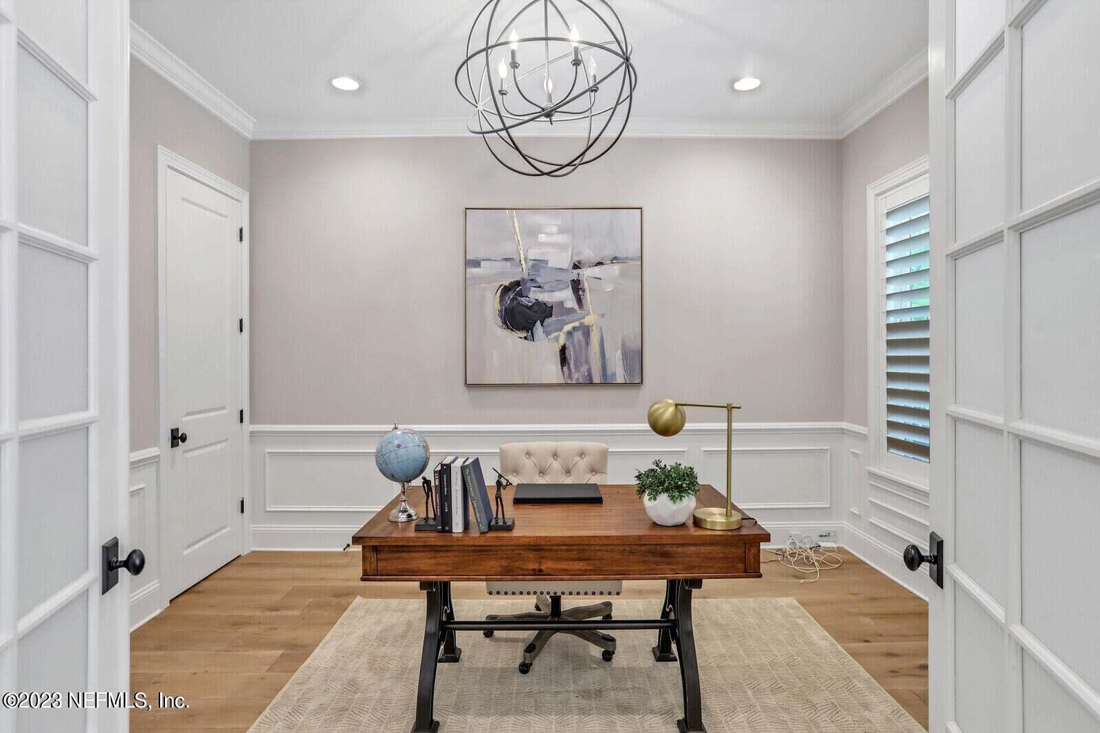 168 Hickory Hill Drive St. Augustine, FL 32095 - Photo 14 of 42 a view of a dining room with furniture window and wooden floor