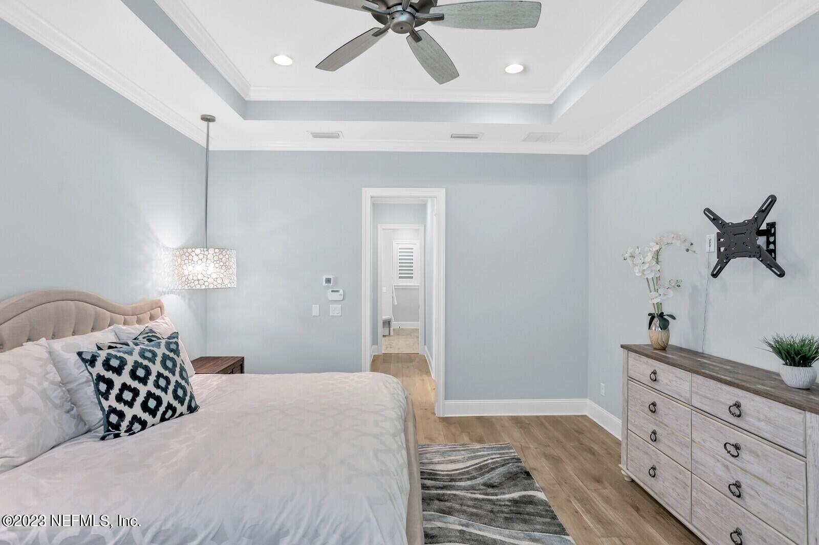 168 Hickory Hill Drive St. Augustine, FL 32095 - Photo 15 of 42 a bedroom with a bed and a dresser