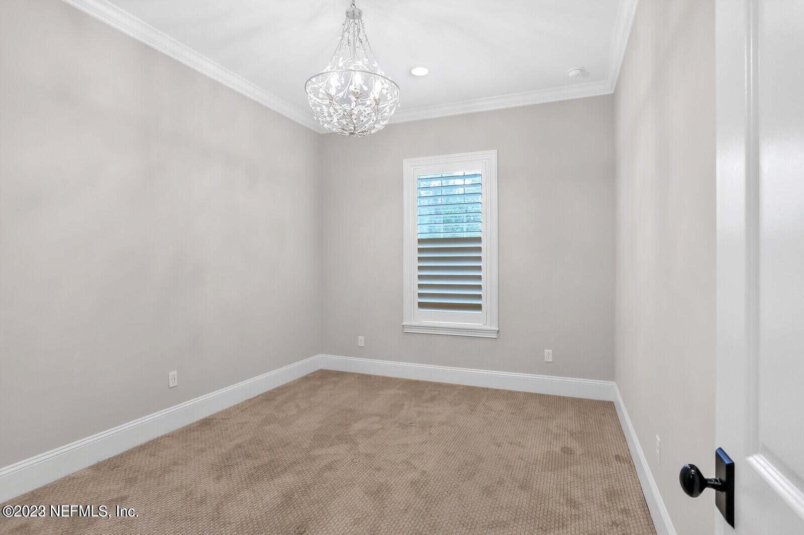 168 Hickory Hill Drive St. Augustine, FL 32095 - Photo 28 of 42 a view of empty room with windows