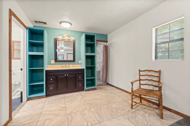 a room with furniture and window