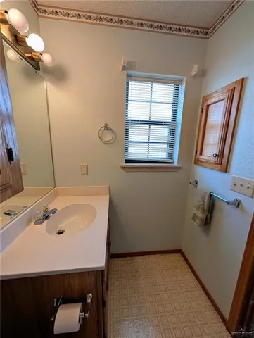 a bathroom with a sink and a bathtub