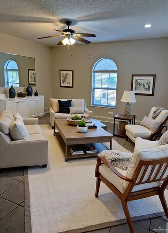 a living room with furniture and a window