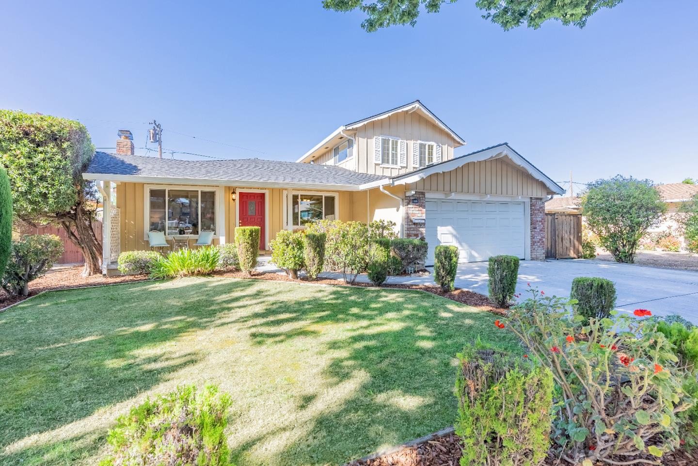 1069 East Homestead Road Sunnyvale, CA 94087 - Photo 1 of 36 a front view of a house with garden