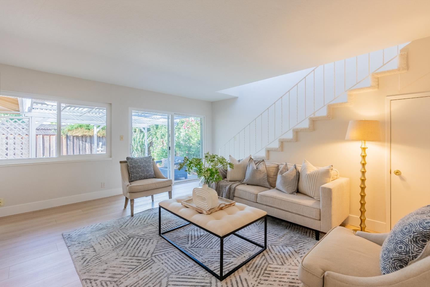 1069 East Homestead Road Sunnyvale, CA 94087 - Photo 15 of 36 a living room with furniture and a potted plant