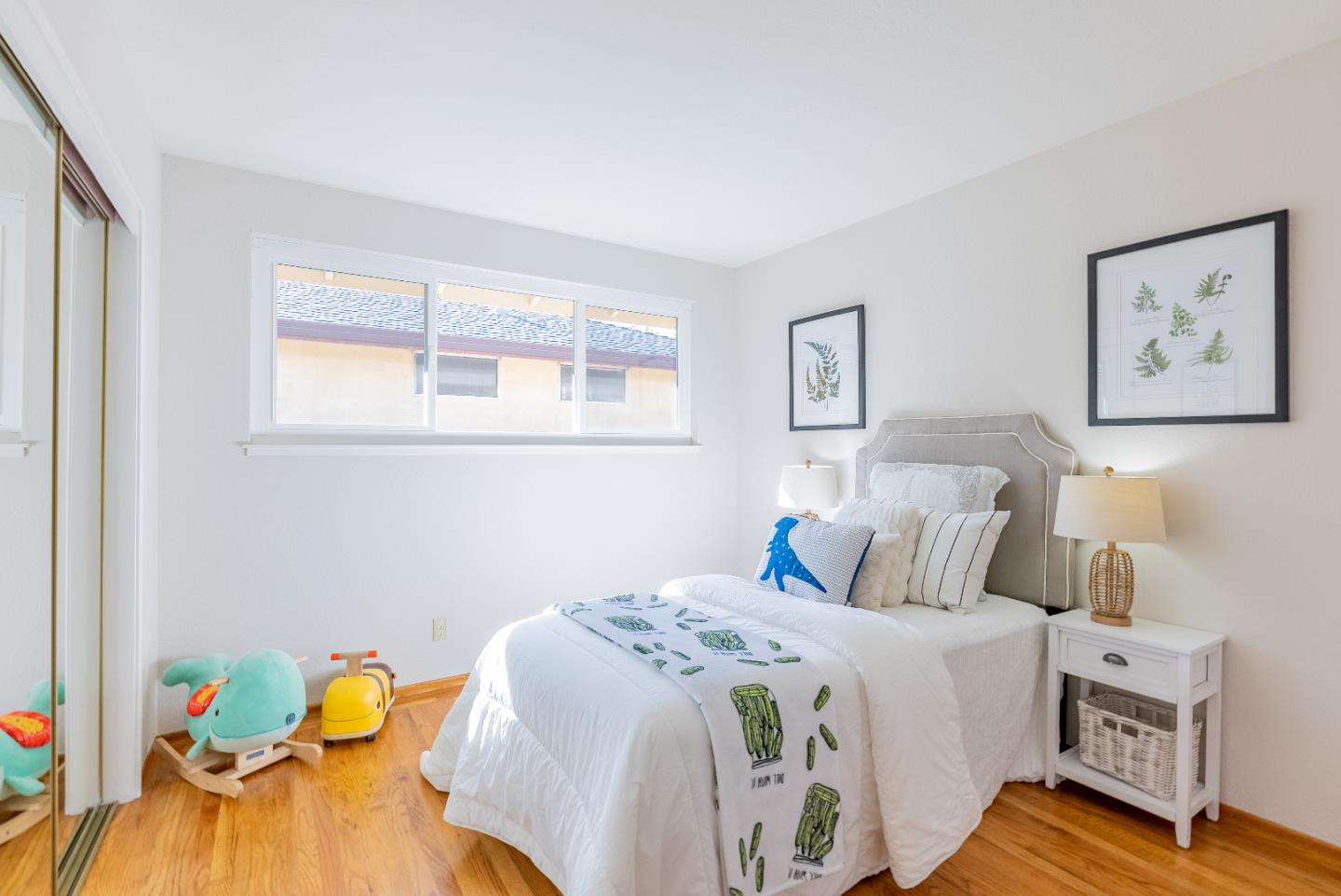 1069 East Homestead Road Sunnyvale, CA 94087 - Photo 18 of 36 a bedroom with a bed and a painting on the wall