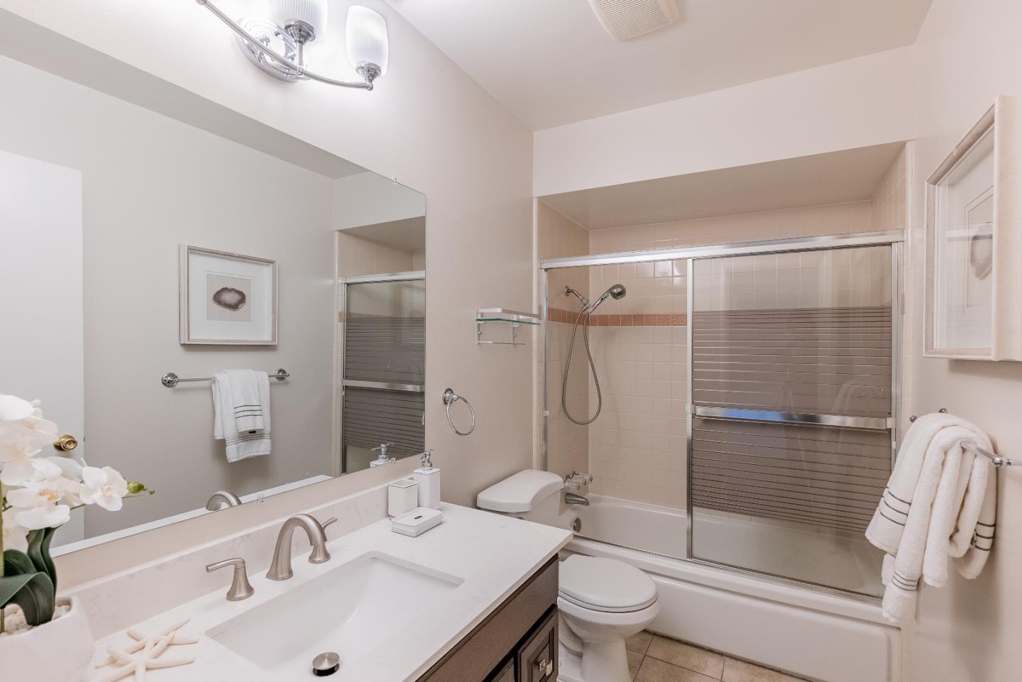 1069 East Homestead Road Sunnyvale, CA 94087 - Photo 20 of 36 a bathroom with a sink toilet and shower