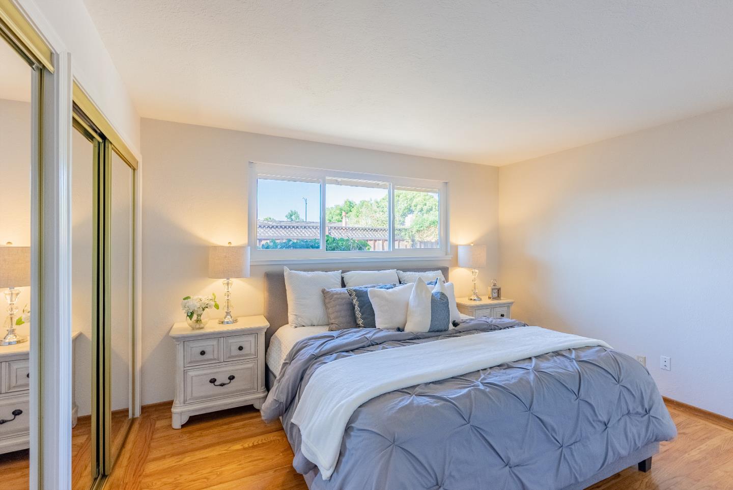1069 East Homestead Road Sunnyvale, CA 94087 - Photo 23 of 36 a bedroom with a bed and large window
