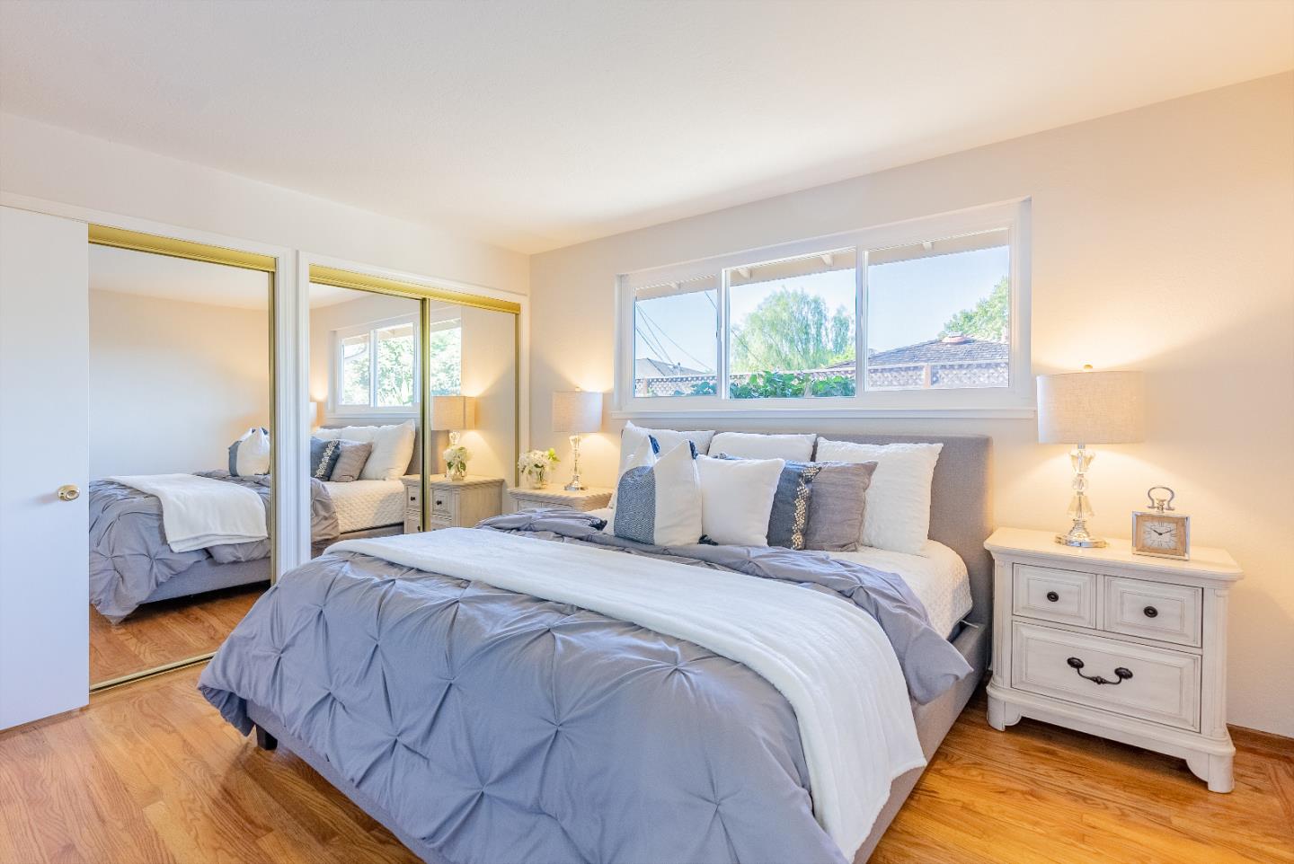 1069 East Homestead Road Sunnyvale, CA 94087 - Photo 24 of 36 a bedroom with a bed and a couch