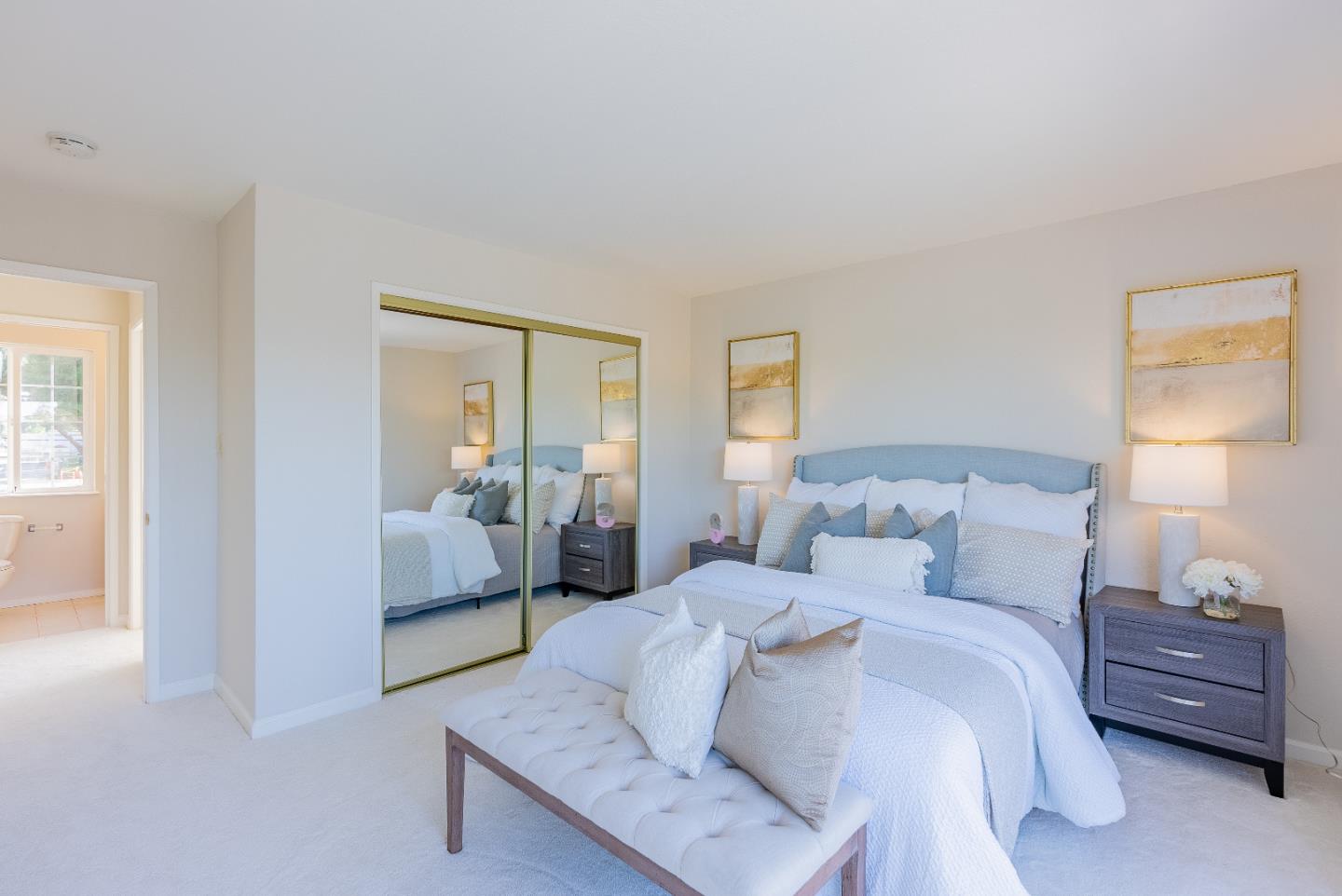 1069 East Homestead Road Sunnyvale, CA 94087 - Photo 30 of 36 a bedroom with a bed and a couch