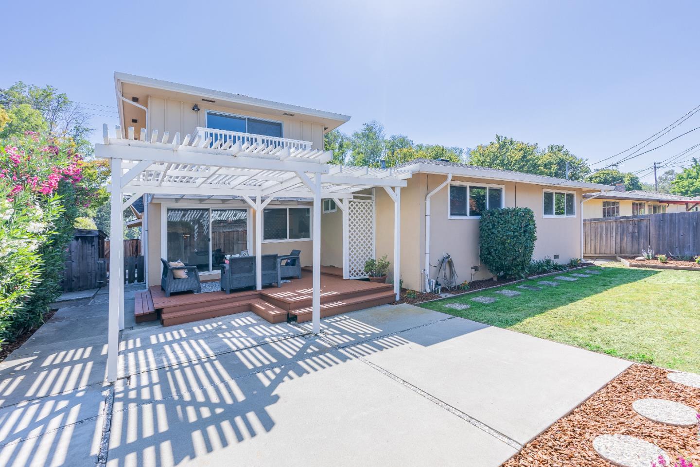 1069 East Homestead Road Sunnyvale, CA 94087 - Photo 33 of 36 a front view of a house with garden