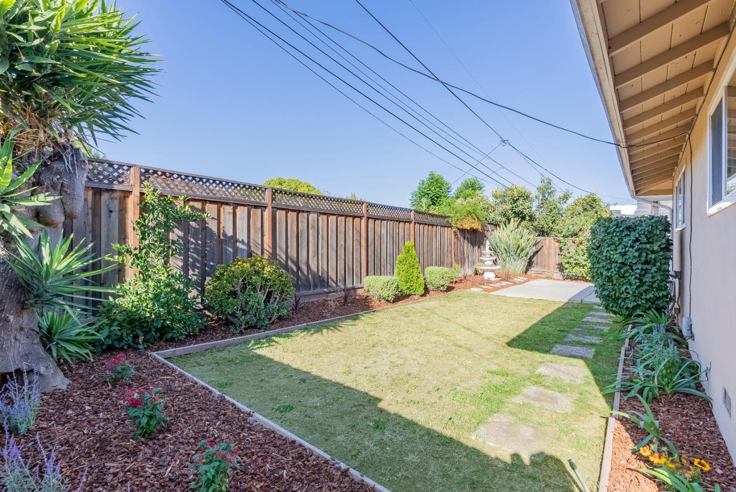 1069 East Homestead Road Sunnyvale, CA 94087 - Photo 35 of 36 a view of a backyard with potted plants