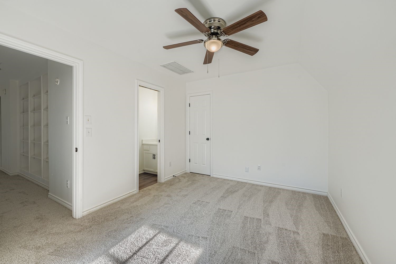 34411 Fulshear Farms Road Fulshear, TX 77441 - Photo 25 of 29 an empty room with a ceiling fan and a window