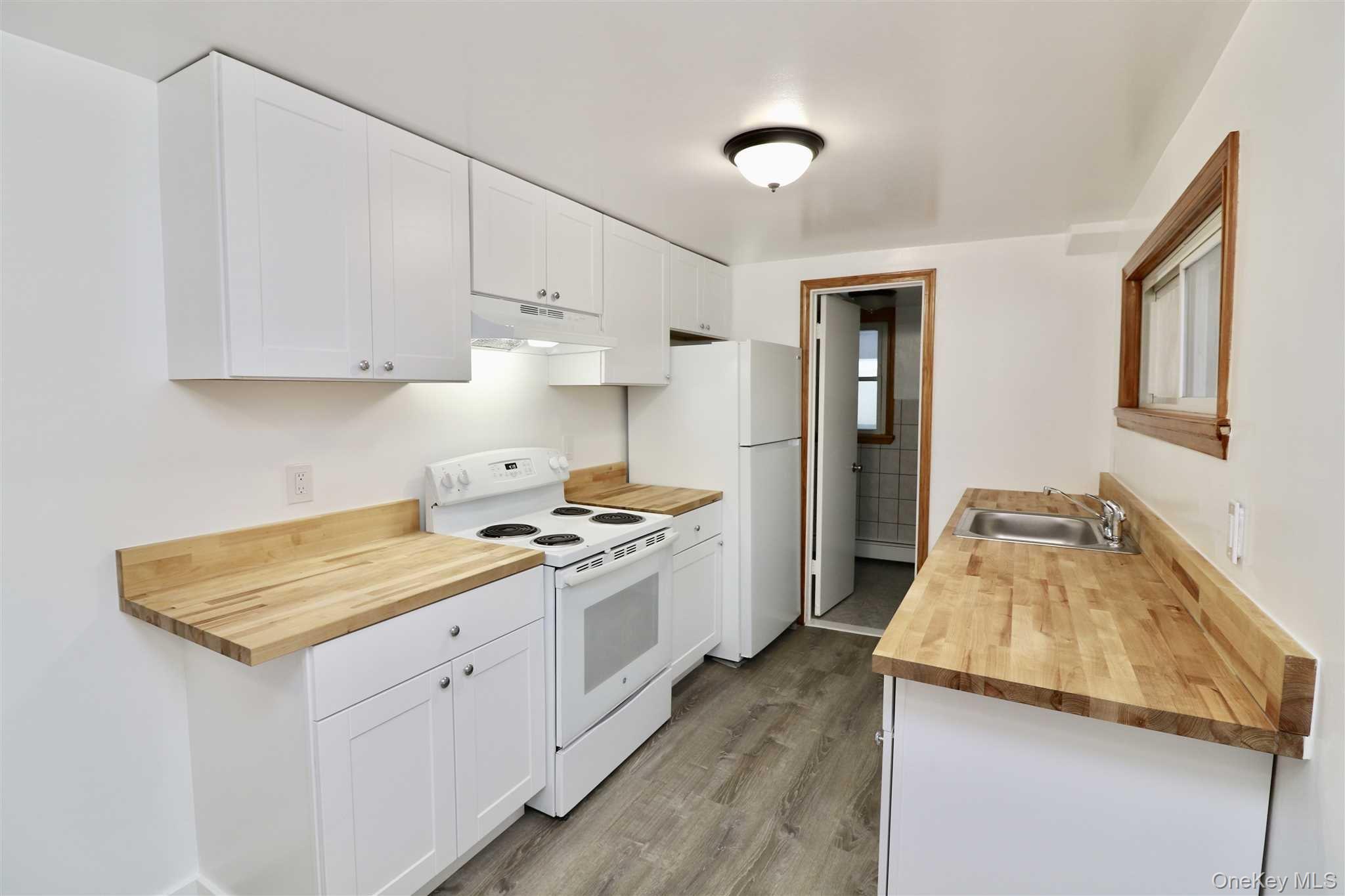 128 Catherine Street, Unit A Beacon, NY 12508 - Photo 8 of 18 a kitchen that has a sink and a stove