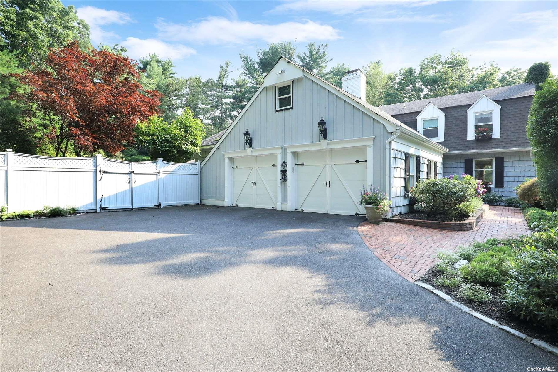 a view of garage and yard