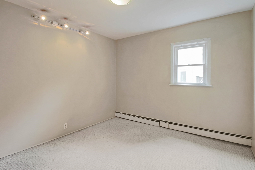 13 Superior Road Worcester, MA 01604 - Photo 11 of 40 a view of a room that has a window in it