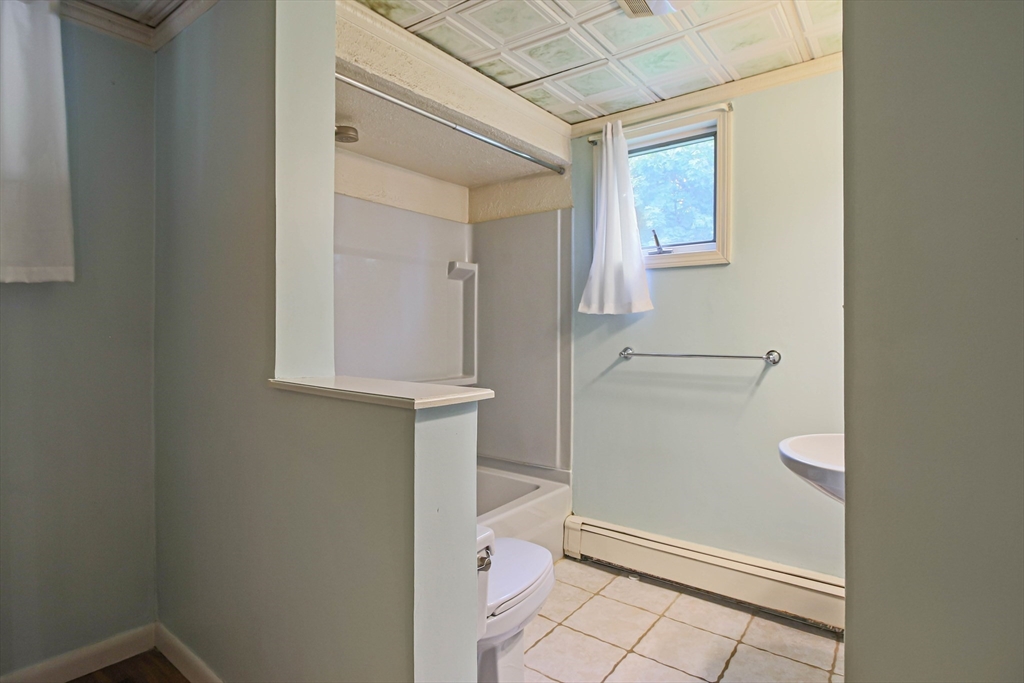 13 Superior Road Worcester, MA 01604 - Photo 13 of 40 a bathroom with a sink and toilet