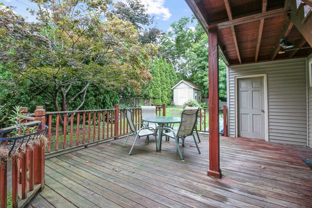 13 Superior Road Worcester, MA 01604 - Photo 24 of 40 a view of a chairs and table on the wooden floor