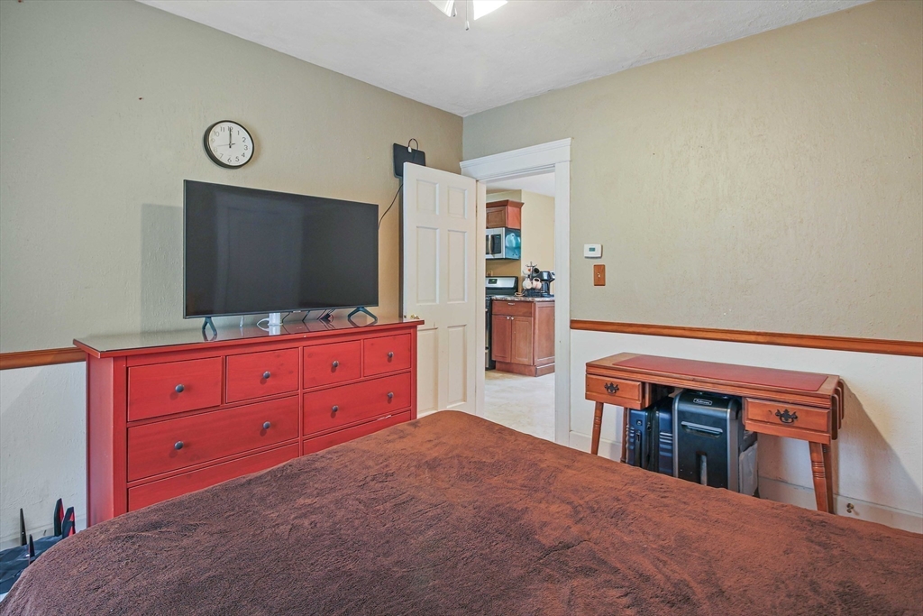 13 Superior Road Worcester, MA 01604 - Photo 32 of 40 a living room with furniture and flat screen tv