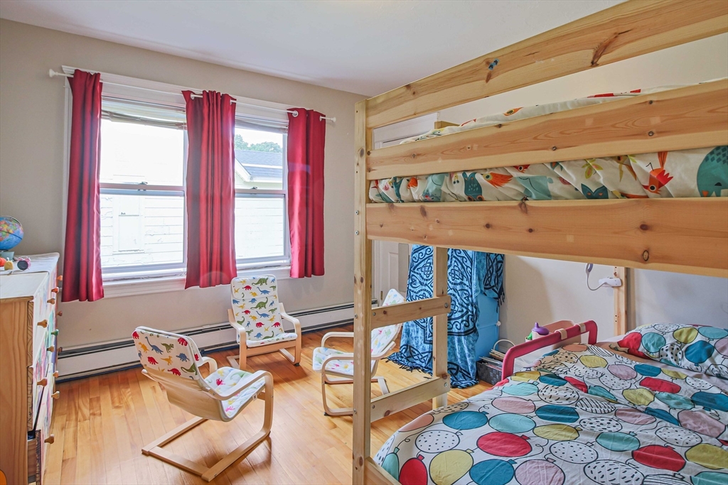 13 Superior Road Worcester, MA 01604 - Photo 34 of 40 a bedroom with a bed and a couch