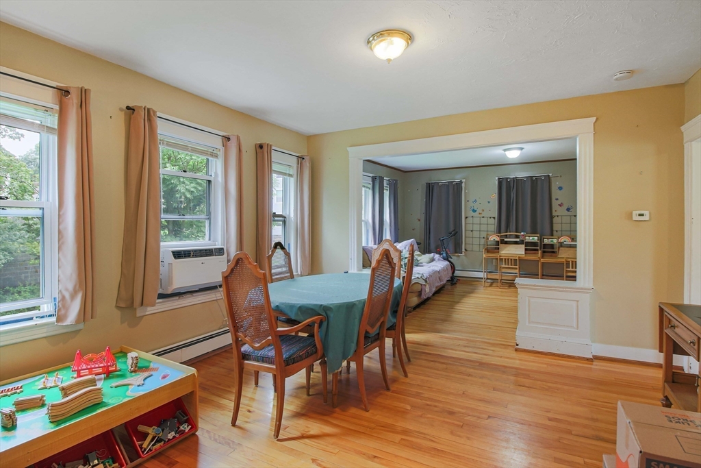 13 Superior Road Worcester, MA 01604 - Photo 36 of 40 a dining room with wooden floor and large window