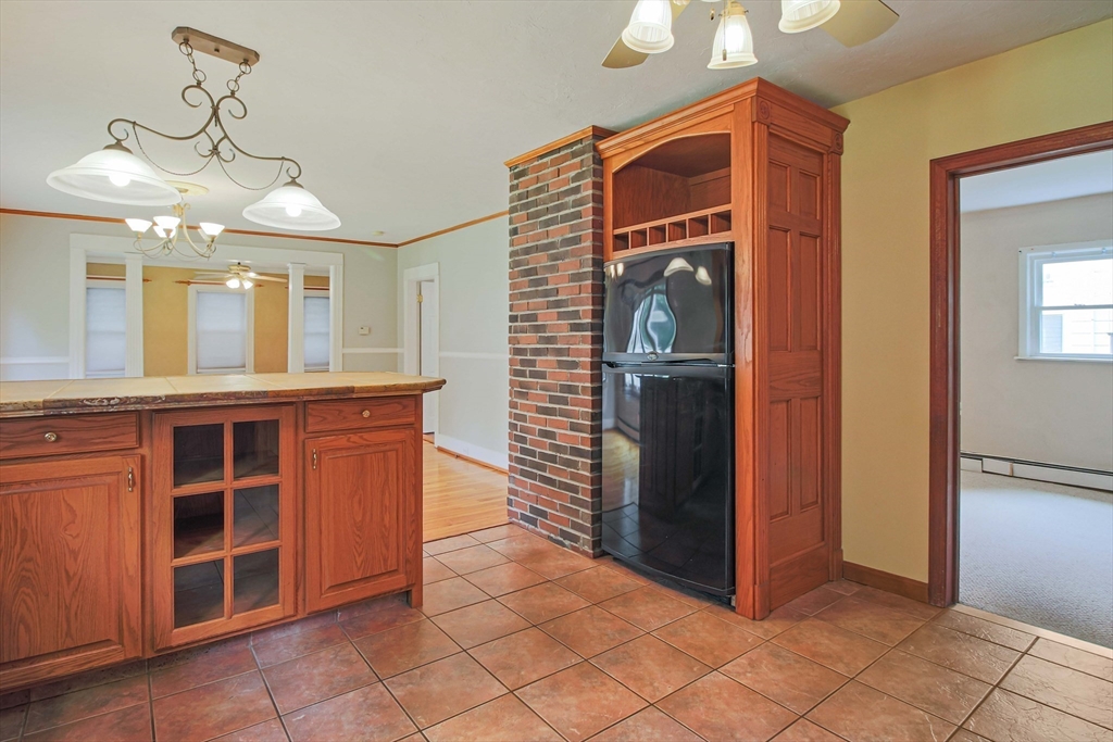 13 Superior Road Worcester, MA 01604 - Photo 8 of 40 a view of a hallway with chandelier and entryway