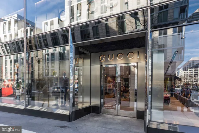 a view of a building and a glass door