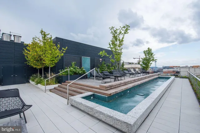 a view of house with yard and entertaining space