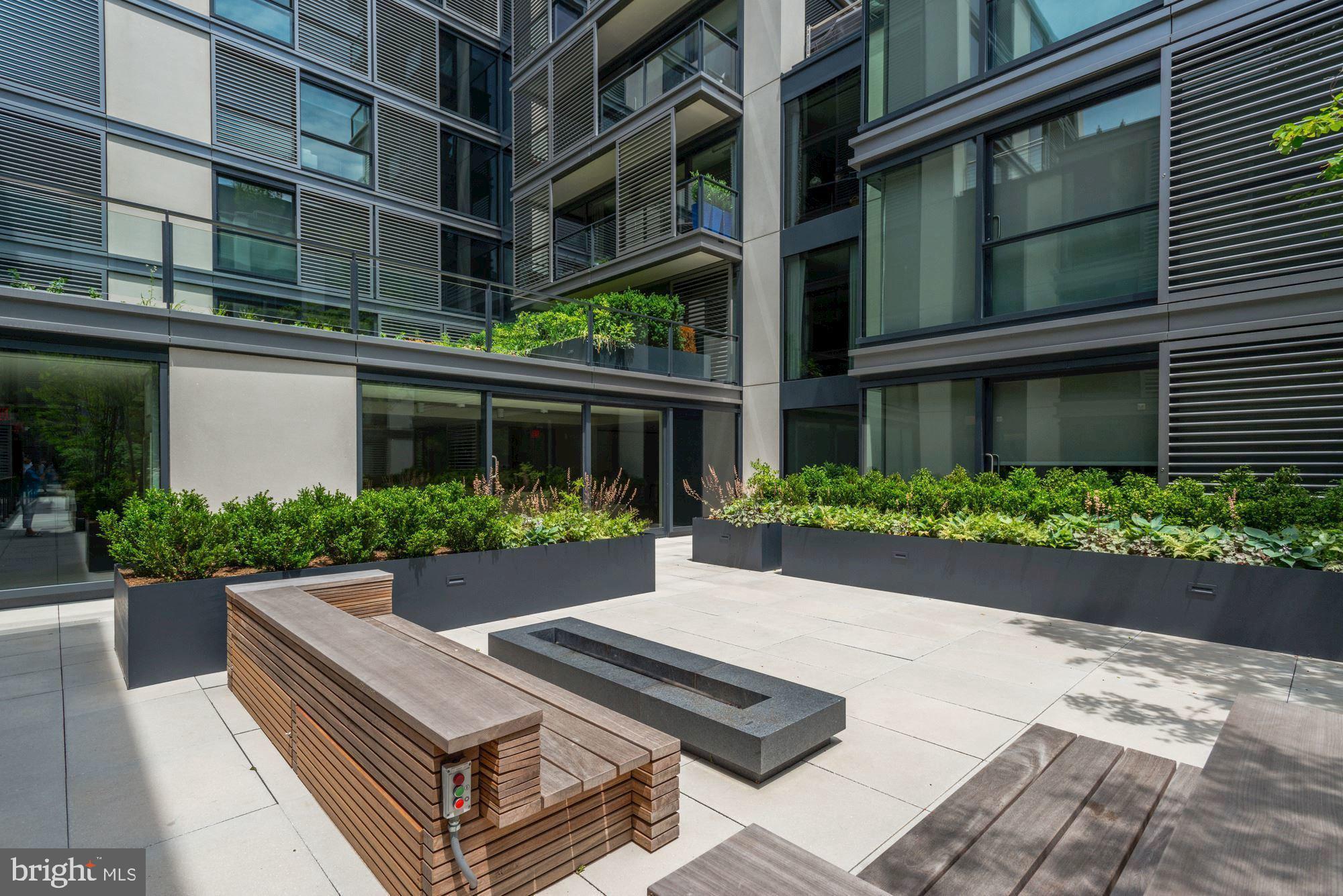 925 H Street Northwest, Unit 901/902 Washington, DC 20001 - Photo 28 of 29 a view of house with an outdoor space
