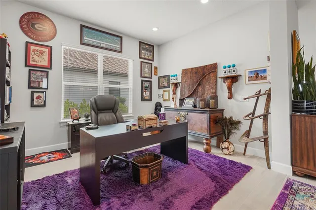 a view of a workspace with furniture