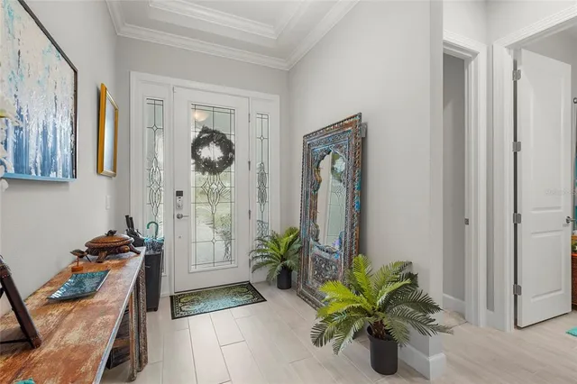 a view of a entryway with wooden floor