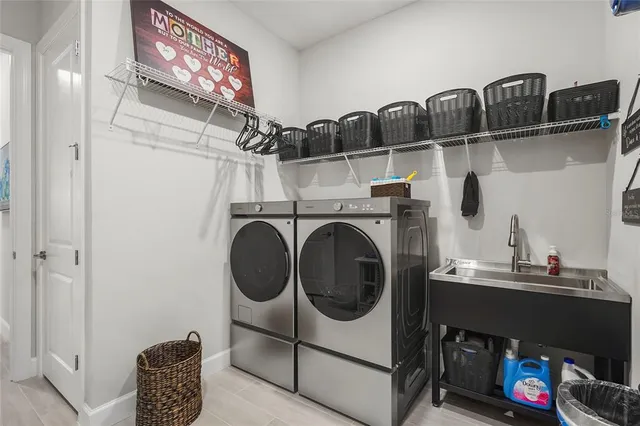 a utility room with dryer and washer