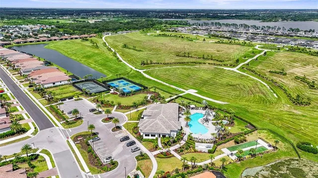 a view of a swimming pool and an outdoor space