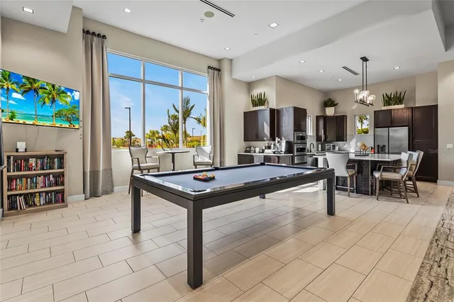 a living room with furniture and a table