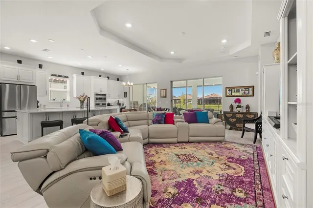 a living room with furniture and a rug
