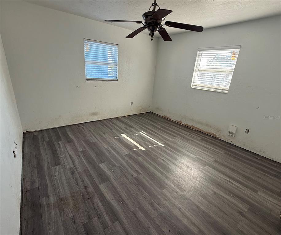 1129 Southwest Golden Avenue Arcadia, FL 34266 - Photo 17 of 25 wooden floor in an empty room