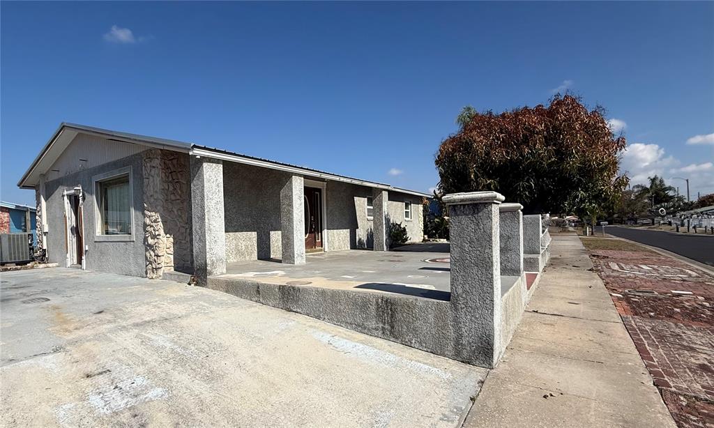 1129 Southwest Golden Avenue Arcadia, FL 34266 - Photo 2 of 25 a view of a house with a backyard