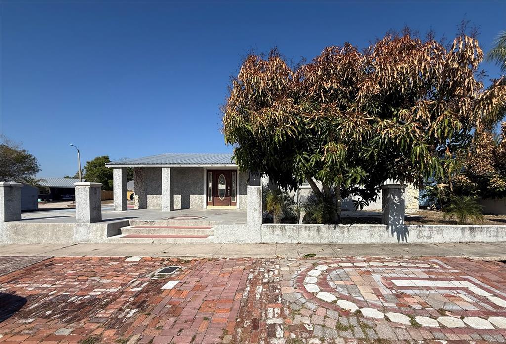 1129 Southwest Golden Avenue Arcadia, FL 34266 - Photo 25 of 25 a front view of a house with a yard