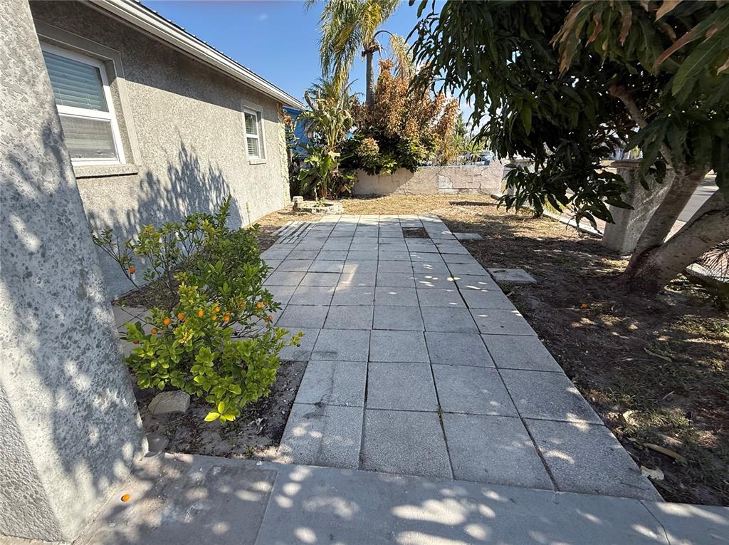 1129 Southwest Golden Avenue Arcadia, FL 34266 - Photo 3 of 25 a view of a pathway with a yard