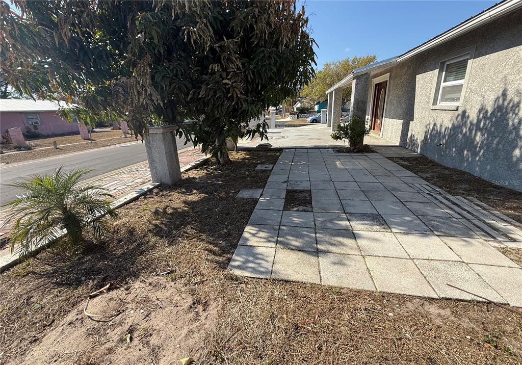 1129 Southwest Golden Avenue Arcadia, FL 34266 - Photo 4 of 25 a view of a yard with plants and trees